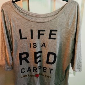 medium loose fit ladies Life is a red carpet top
